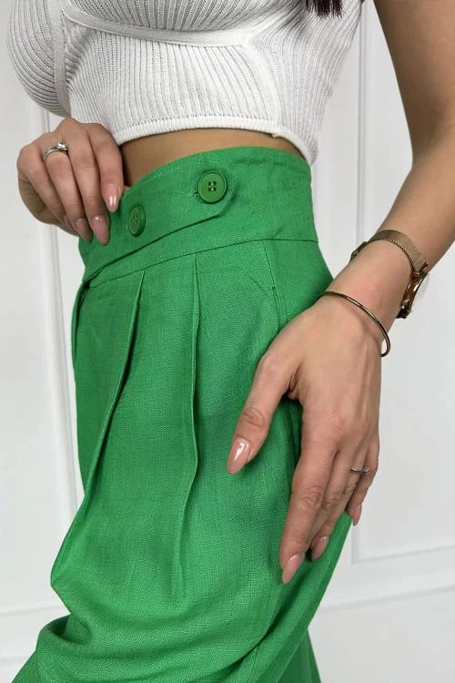 Women's trousers with asymmetric buttons