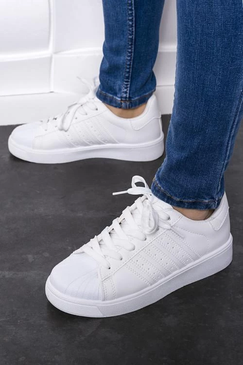 Tenisi din piele pentru femei